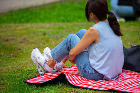 Activities organized by the community, enjoy life together again, picnic and rest on the grassの写真素材