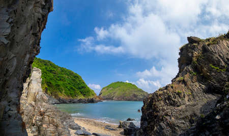 Beautiful bay with natural rocks and blue sea and blue sky
