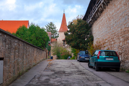 The old clock tower on the streets of the fairy tale town of Rothenburg, Germanyのeditorial素材