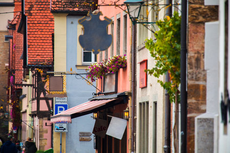 The old clock tower on the streets of the fairy tale town of Rothenburg, Germanyのeditorial素材