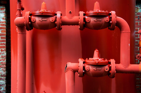 Red boiler in the old winery park in the historic buildingの写真素材