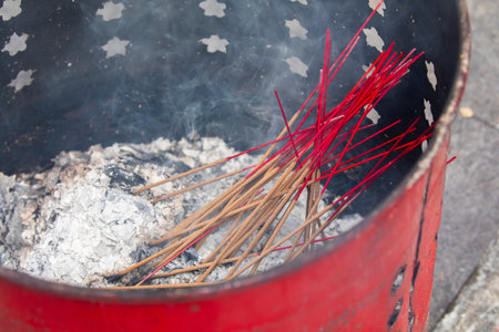 Chinese ghost festival believers burned to the stove of God's ghost paper moneyの写真素材