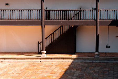 Stone stairway leading to the entrance to the building with a wooden doorの写真素材