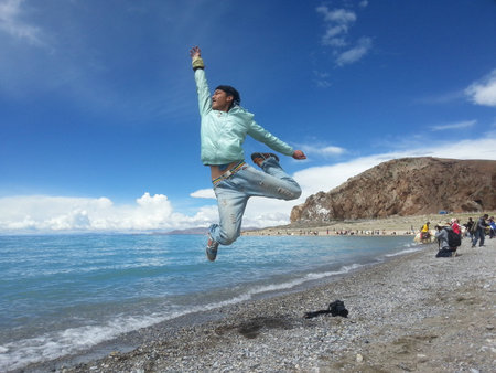 Jumping beside the seaのeditorial素材