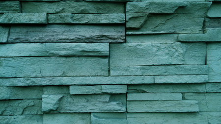 Background of blue sky stone wall made with blocks.の写真素材