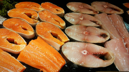 Salmon & Scomberomorus are arranged on a trayの写真素材