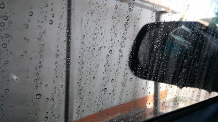 Water drops on a car windowの写真素材