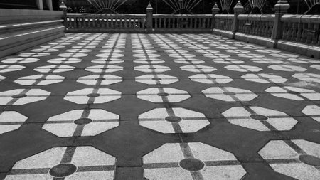 The black-white color patterns on the brick floor background at Thai templeの写真素材