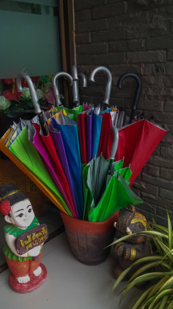 colorful umbrella plug in a jarの写真素材