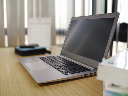 Computer laptop on desk at the officeの写真素材