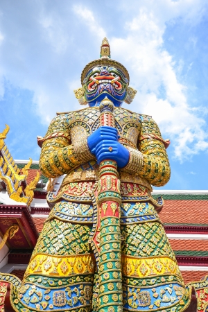 Giant statue at the gate in Wat Phra Kaewの写真素材