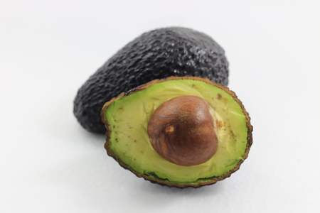 green avocados isolated on the white background