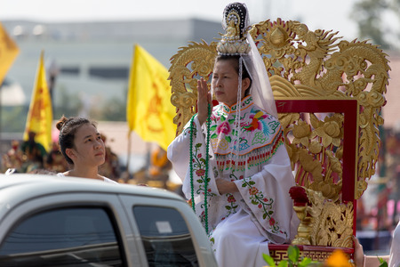 Nakhon Ratchasima, THAILAND - OCT 16 : An unidentified devotee of Vegetarian Festival, person who invites the spirits of gods to possess their bodies on October 16, 2015 in Nakhon Ratchasima, Thailandのeditorial素材