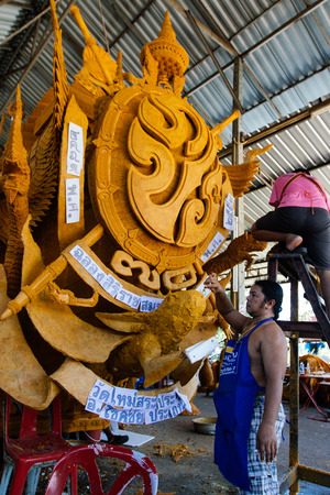 Nakhon ratchasima  Candle Festival, The Candles are carved out of wax, Thai art  July 17, 2016, Nakhon ratchasima, Thailand.のeditorial素材