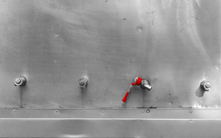 Faucet with handles red.