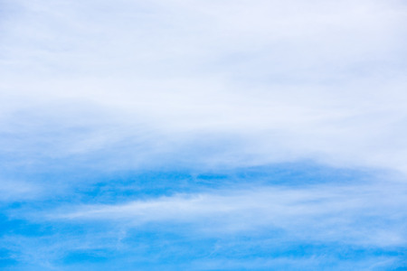 Fluffy clouds and blue skyの写真素材