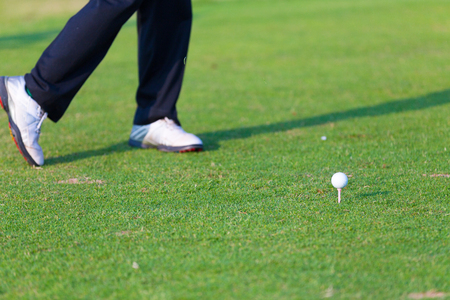Man playing golfの写真素材