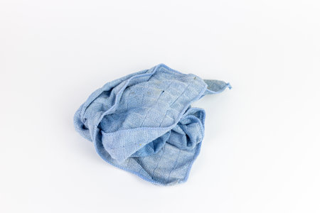 Blue rag isolated on white background. Clipping path included in file.の写真素材