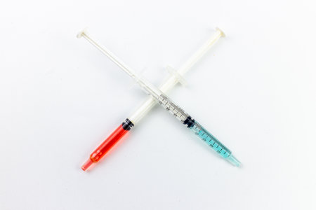Syringe and hypodermic needle isolated on white background.の写真素材