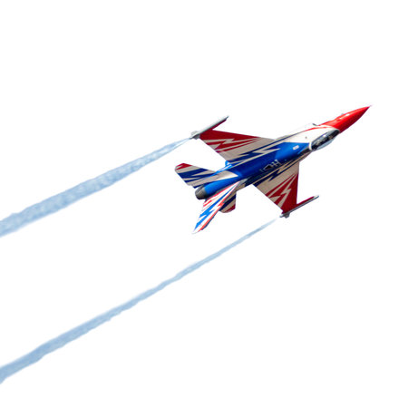 An F-16 fighter jet performs during an air show on a white background.