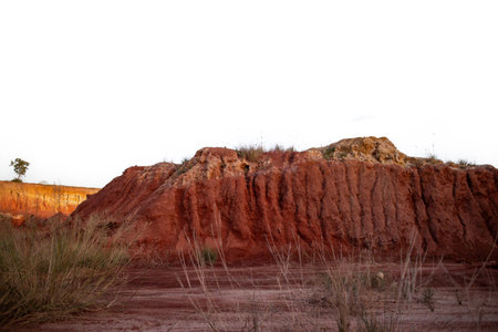 Stunning red sandstone cliffs and canyons in a scenic desert landscape under a clear blue sky