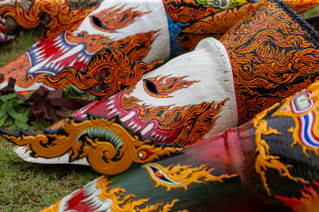 Phi Ta Khon mask painting, a traditional Thai art form with colorful religious and cultural motifs.の写真素材
