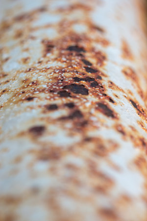 Rusty corrugated metal texture background. Selective focus.