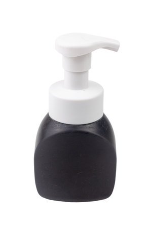 Black plastic container with a pump dispenser holds beauty liquid for body care and hygieneの写真素材