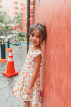 Portrait of little girl asian  relax at hotel resortの写真素材