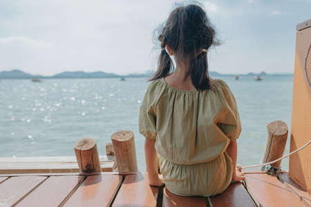 Happy little girl on vacationの写真素材