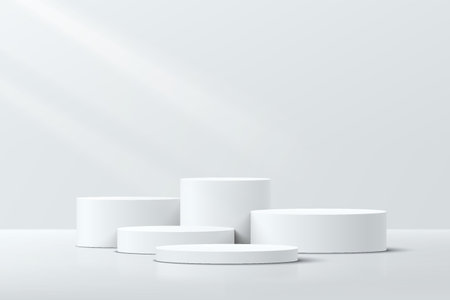 White realistic 3D cylinder steps pedestal podium set with shadow and lighting. Vector abstract studio room with geometric platform design. Gray minimal scene for products display.のイラスト素材
