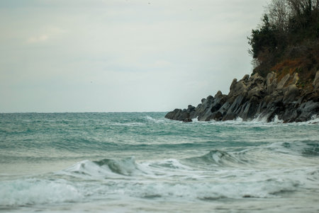 Beautiful seascape. Sea waves crashing on the rocks.