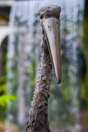 Wooden stork head in the park, closeup of photoの写真素材