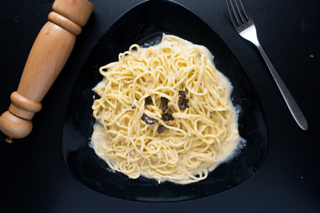 Panna Cota served in a jar isolated on dark background top view of italian foodの写真素材