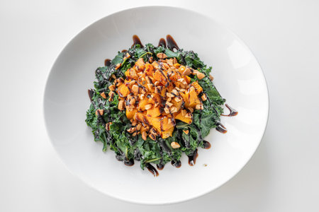 Kale and Squash Salad served in a dish isolated on grey background top viewの写真素材
