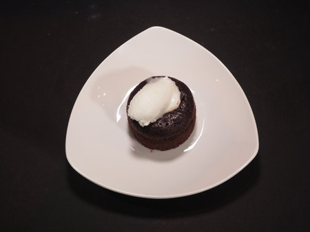 Coulant De Chocolate served in a dish isolated on dark background top viewの写真素材