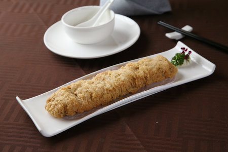 Hujiang fried vegetarian goose in a dish isolated on grey background side view of Hong kong foodの写真素材