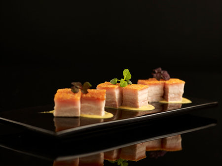 Roasted Pork Belly served in dish isolated on table top view of foodの写真素材