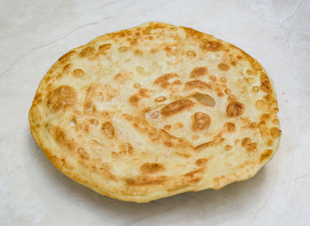 served in plate isolated on table top view of indian and pakistani spicy food