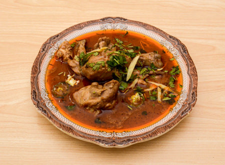 Tasty Chicken nihari served in plate isolated on table top view indian spicy food