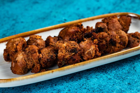 spicy bbq chicken tikka boti kabab served in a dish isolated on background top viewの写真素材