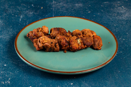 spicy bbq chicken tikka boti kabab served in a dish isolated on background top viewの写真素材