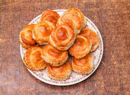 Bakery Chicken Patties in a plate on dark wooden background top viewの写真素材