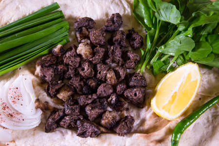 Spicy Tikka Bahraini Laham boti served in dish isolated on background top view of arabic foodの写真素材