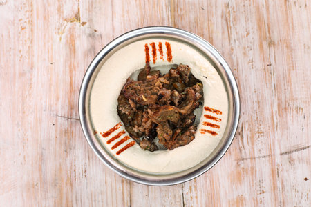 Hummus Shawarma served in dish isolated on background top of arabic food cold mezzaの写真素材
