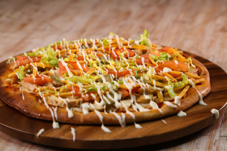 Arabic shawarma pizza served in cutting board isolated on background top view of fast foodの写真素材