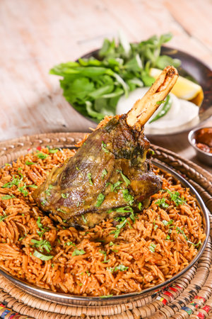 Machboos Laham biryani with lamb chop served in dish isolated on table top view of arab foodの写真素材