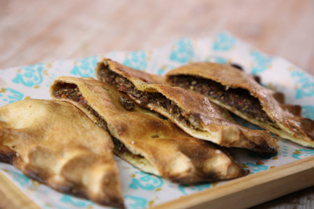 Traditional turkish baked dish pide. Turkish borek with meat filling