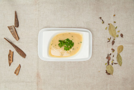 Keitto served in a dish isolated on table top view of indian spices food