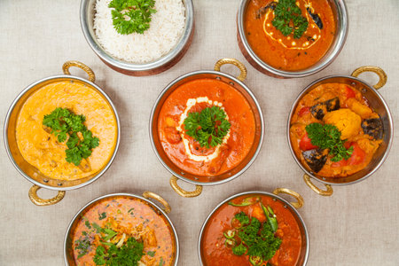 assorted indian food Plain rice, Chicken butter masala, Beef handi, Mushroom jalfrezi, Chicken...